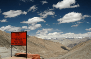 Khardung La top Ladakh India on motorcycle