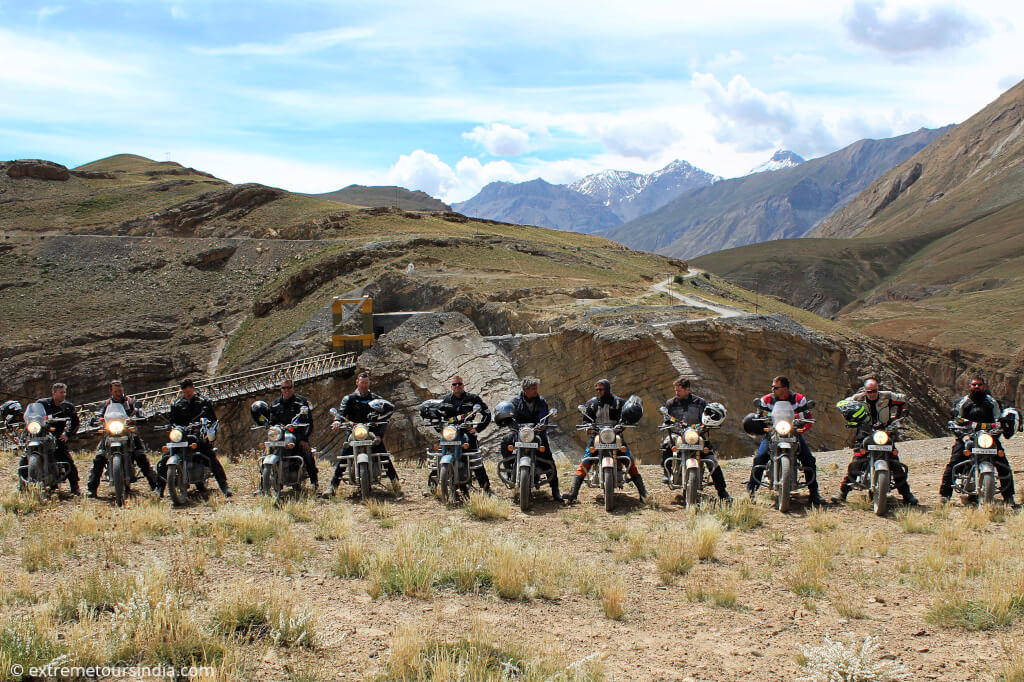 Group of motorcyclists posing at Spiti Valley 